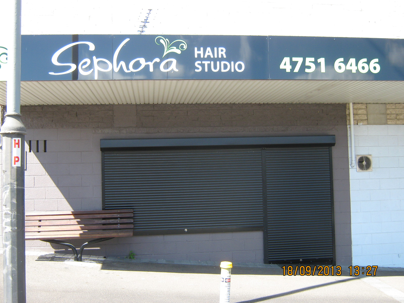 Commercial Project - Hair Studio with shutters closed