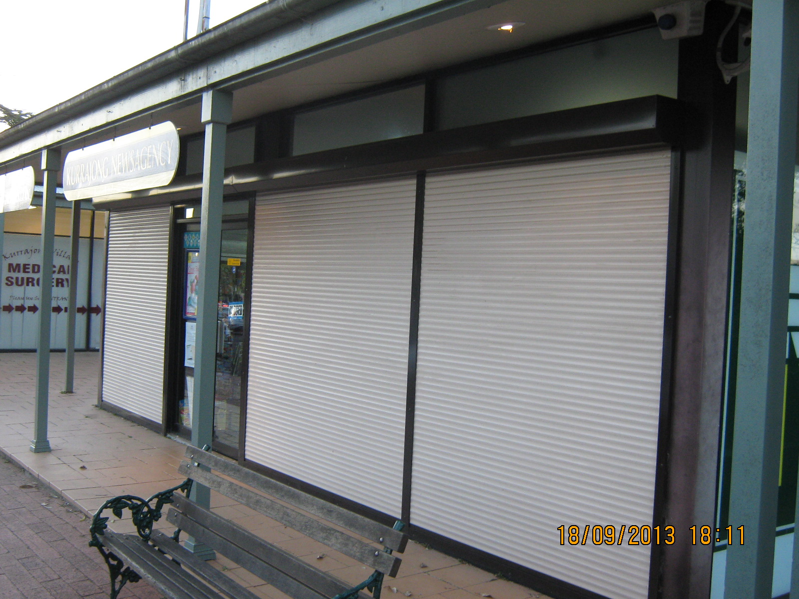 Commercial Project - Kurrajong News Agency with shutters closed